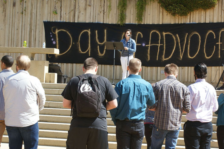 A person speaking to a group on people on the Day of Advocacy.